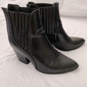 Black snakeskin cowboy bootie